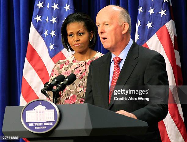 David Mackay , chair of the Healthy Weight Commitment Foundation and CEO of Kellogg Company, speaks as U.S. First lady Michelle Obama listens at the...