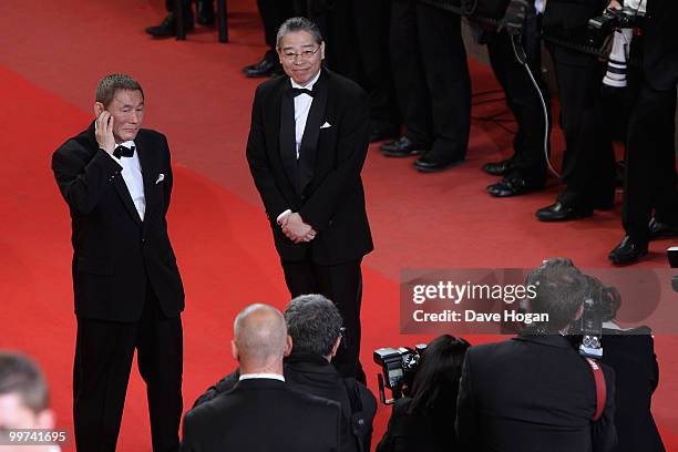 Director Takeshi Kitano and Masayuki Mori attend the "Outrage" Premiere at the Palais des Festivals during the 63rd Annual Cannes Film Festival on...