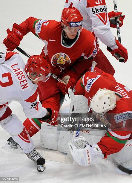 Belarus' goalkeeper Vitali Koval and Denmark's Philip Larsen vie during the IIHF Ice Hockey World Championship match Belarus vs Denmark in the...