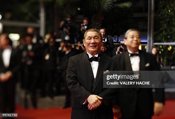 Japanese actor and director Takeshi Kitano arrives for the screening of "Outrage" presented in competition at the 63rd Cannes Film Festival on May...