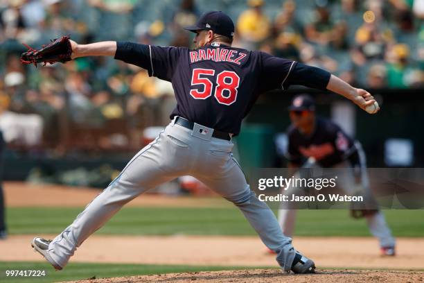 Neil Ramirez of the Cleveland Indians pitches against the Oakland Athletics during the seventh inning at the Oakland Coliseum on July 1, 2018 in...