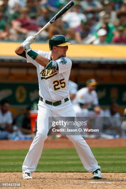 Stephen Piscotty of the Oakland Athletics at bat against the Cleveland Indians during the seventh inning at the Oakland Coliseum on July 1, 2018 in...