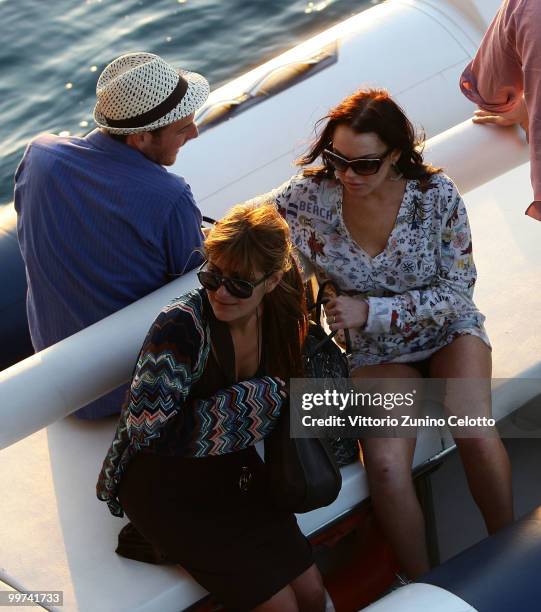 Actress Lindsay Lohan departs to attend Press Meeting aboard Lancia "Signora Del Vento" on May 17, 2010 in Cannes, France.