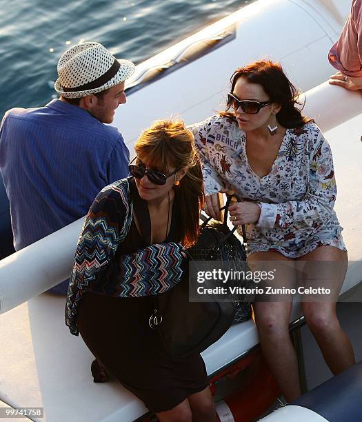 Actress Lindsay Lohan departs to attend Press Meeting aboard Lancia "Signora Del Vento" on May 17, 2010 in Cannes, France.