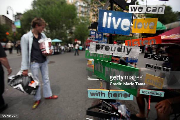 Artwork is displayed and on sale in Union Square May 17, 2010 in New York City. Mayor Michael Bloomberg's administration wants to cut the number of...