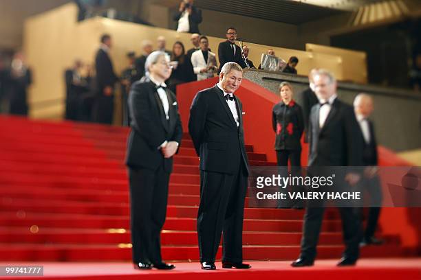 Japanese actor and director Takeshi Kitano arrive for the screening of "Outrage" presented in competition at the 63rd Cannes Film Festival on May 17,...