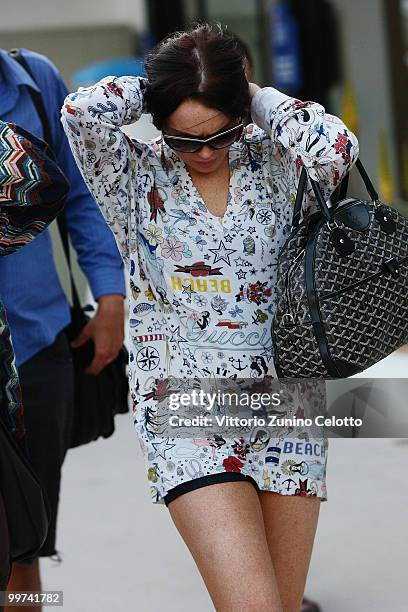 Actress Lindsay Lohan departs to attend Press Meeting aboard Lancia "Signora Del Vento" on May 17, 2010 in Cannes, France.