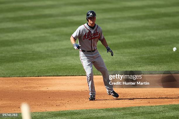 Third baseman Chipper Jones of the Atlanta Braves leads off second base during a game against the Philadelphia Phillies at Citizens Bank Park on May...