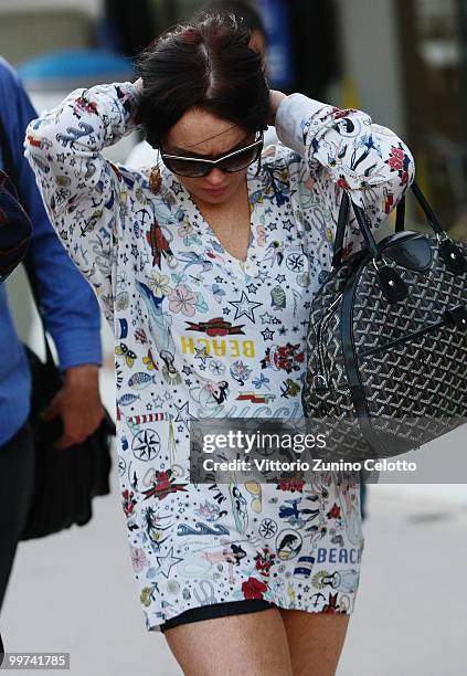 Actress Lindsay Lohan departs to attend Press Meeting aboard Lancia "Signora Del Vento" on May 17, 2010 in Cannes, France.