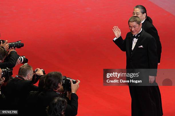 Director Takeshi Kitano and Masayuki Mori attend "Outrage" Premiere at the Palais des Festivals during the 63rd Annual Cannes Film Festival on May...