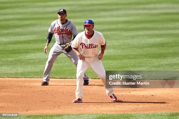 Catcher Brian Schneider of the Philadelphia Phillies leads off second base during a game against the Atlanta Braves at Citizens Bank Park on May 8,...