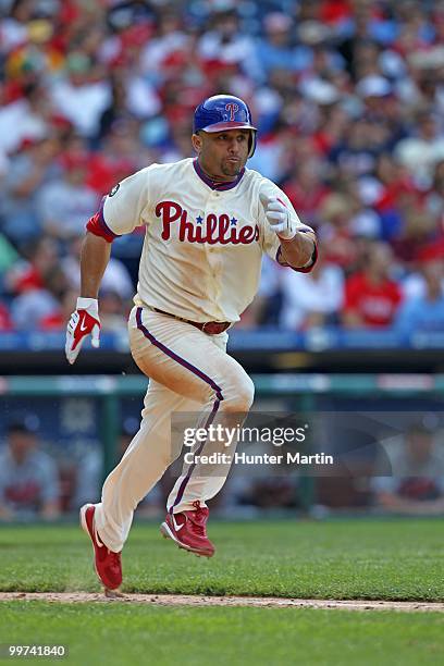 Third baseman Placido Polanco of the Philadelphia Phillies runs to first base during a game against the Atlanta Braves at Citizens Bank Park on May...