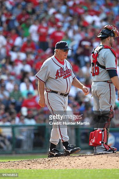 Manager Bobby Cox of the Atlanta Braves walks to the pitchers mound during a game against the Philadelphia Phillies at Citizens Bank Park on May 8,...