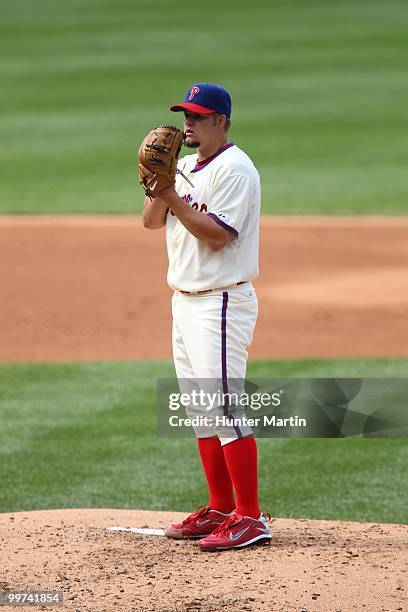 Starting pitcher Joe Blanton of the Philadelphia Phillies sets to deliver a pitch during a game against the Atlanta Braves at Citizens Bank Park on...