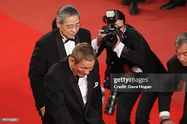 Director Takeshi Kitano and Masayuki Mori attend "Outrage" Premiere at the Palais des Festivals during the 63rd Annual Cannes Film Festival on May...