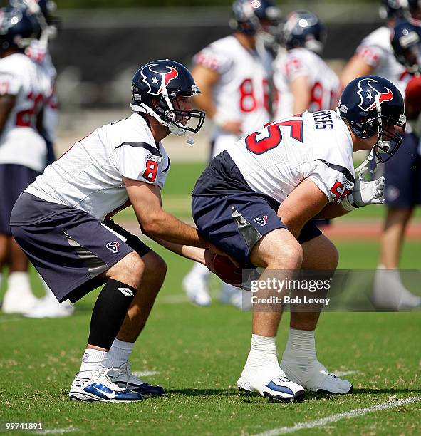 Quarterback Matt Schaub of the Houston Texans takes a snap from center Chris Myers during the first day of OTA's at Reliant Park on May 17, 2010 in...