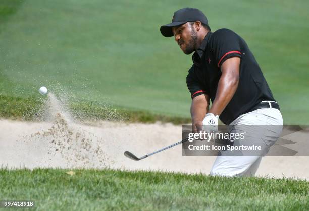 Harold Varner III hits out of a sand trap on the hole during the first round of the John Deere Classic on July 12 at TPC Deere Run, Silvis, IL.