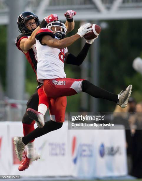 Emanuel Davis of the Calgary Stampeders intercepts an Ottawa Redblacks pass in a regular season Canadian Football League game played at TD Place...