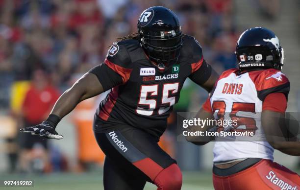 SirVincent Rogers of the Ottawa Redblacks blocks the Calgary Stampeders defines in a regular season Canadian Football League game played at TD Place...