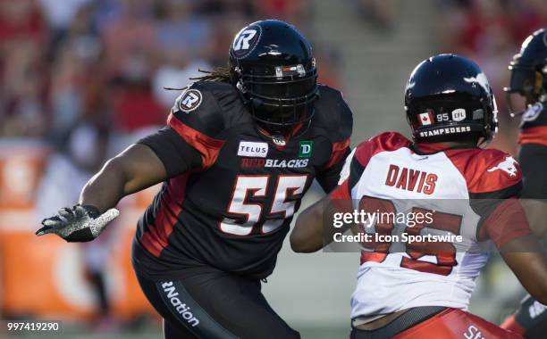 SirVincent Rogers of the Ottawa Redblacks blocks the Calgary Stampeders defines in a regular season Canadian Football League game played at TD Place...