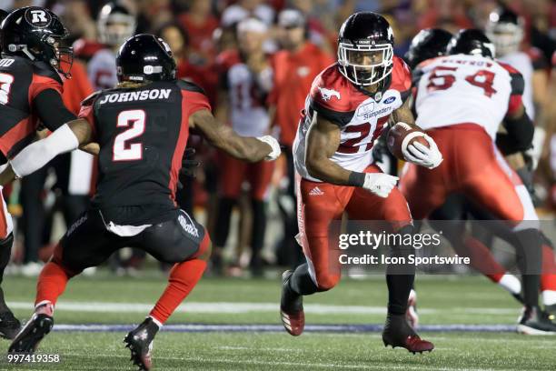 Don Jackson of the Calgary Stampeders runs against the Ottawa Redblacks in a regular season Canadian Football League game played at TD Place Stadium...