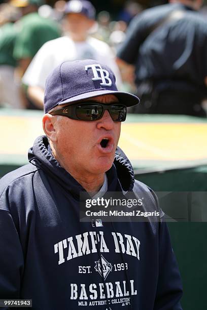 Manager Joe Maddon of the Tampa Bay Rays standing on the field during the game against the Oakland Athletics at the Oakland Coliseum on May 8, 2010...