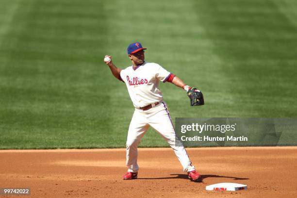 Third baseman Placido Polanco of the Philadelphia Phillies throws to first base during a game against the Atlanta Braves at Citizens Bank Park on May...