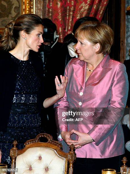 Spain's Princess Letizia chats with German Chancellor Angela Merkel during a gala dinner at The Royal Palace in Madrid on May 17, 2010. European and...