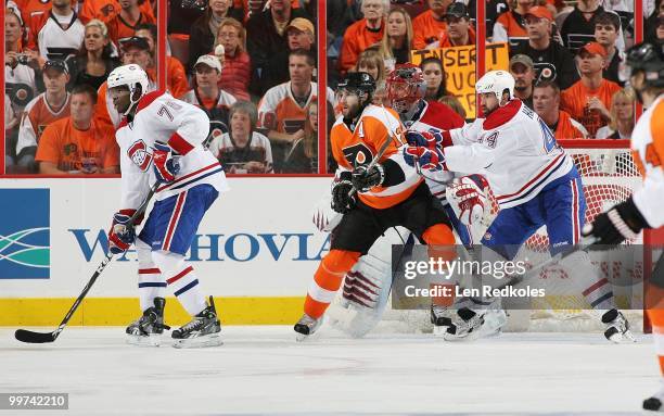 Simon Gagne of the Philadelphia Flyers sets up in the crease for a scoring opportunity against PK Subban, Jaroslav Halak and Roman Hamrlik of the...
