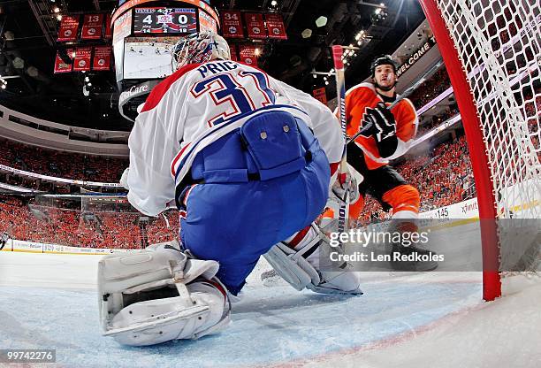 Dan Carcillo of the Philadelphia Flyers sets up for a scoring opportunity against Carey Price of the Montreal Canadiens in Game One of the Eastern...