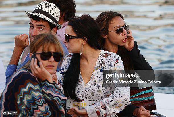 Actress Lindsay Lohan departs to attend Press Meeting aboard Lancia "Signora Del Vento" on May 17, 2010 in Cannes, France.