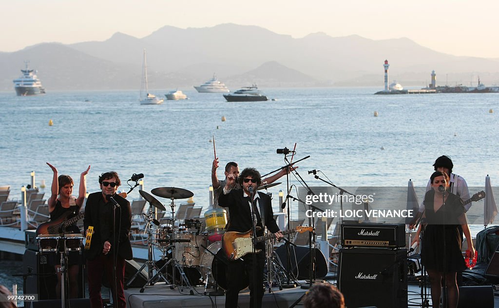 French singer Matthieu Chedid (C) also k