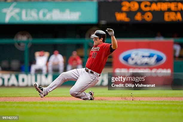 Lance Berkman of the Houston Astros slides into second base against the St. Louis Cardinals at Busch Stadium on May 13, 2010 in St. Louis, Missouri....