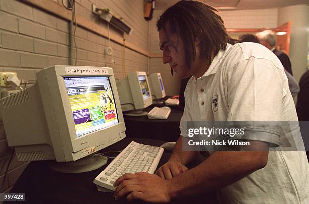 George Smith of the Wallabies looks at the new website on a computer during the Australian Rugby Unions Rugbynet official launch at Sydney Football...