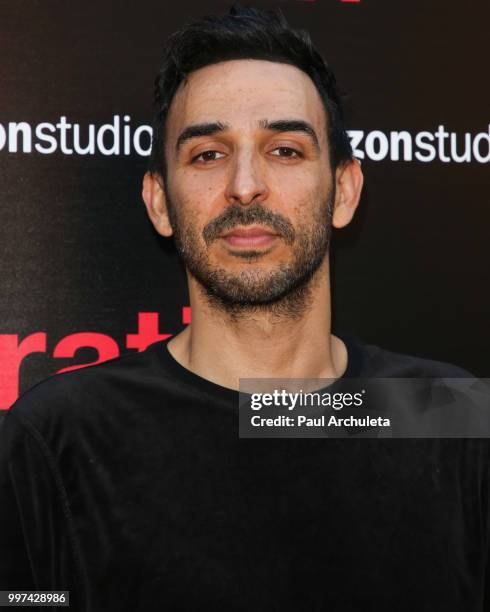 Actor Amir Arison attends the premiere of Amazon Studios' "Generation Wealth" at ArcLight Hollywood on July 12, 2018 in Hollywood, California.