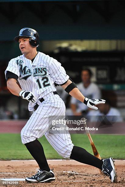 Cody Ross of the Florida Marlins bats during a MLB game against the New York Mets in Sun Life Stadium on May 14, 2010 in Miami, Florida.