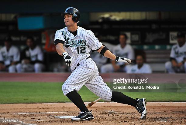 Cody Ross of the Florida Marlins bats during a MLB game against the New York Mets in Sun Life Stadium on May 14, 2010 in Miami, Florida.