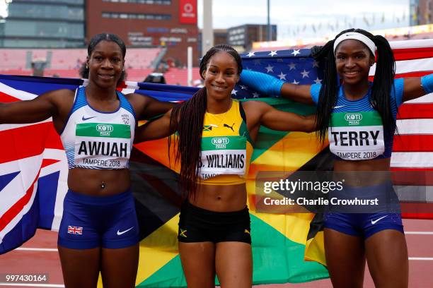 Kristal Awuah of Great Britain, Briana Williams of Jamaica and Twanisha Terry of The USA celebrate after winning medals in the final of the women's...