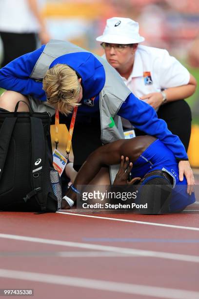 Antonio Grant of Panama receives treatment during heat 1 of the men's 400m semi final on day three of The IAAF World U20 Championships on July 12,...