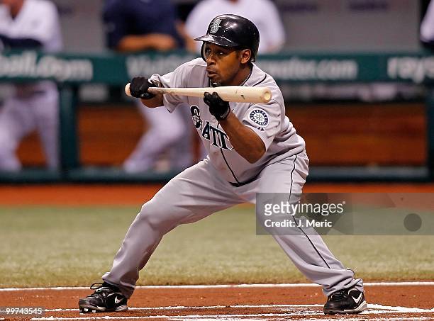 Infielder Chone Figgins of the Seattle Mariners attempts a bunt against the Tampa Bay Rays during the game at Tropicana Field on May 14, 2010 in St....