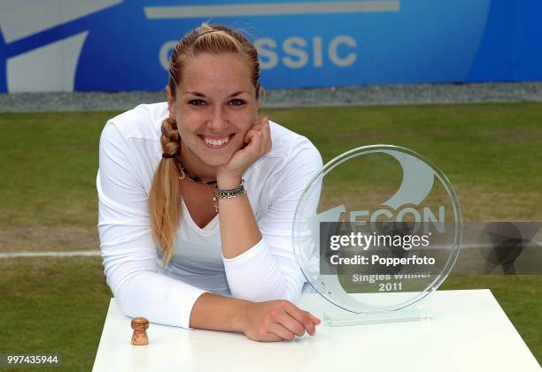 Sabine Lisicki of Germany with the trophy after winning the women's singles championship on day 8 of the AEGON Classic at the Edgbaston Priory Club...