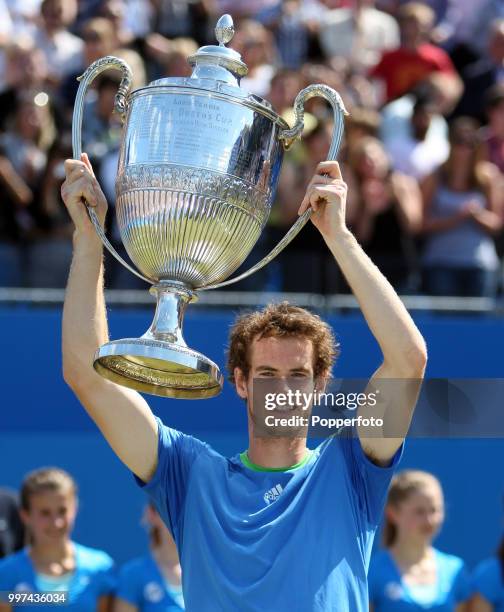 Andy Murray of Great Britain with the trophy after winning the men's singles final on day 8 of the AEGON Classic at the Edgbaston Priory Club in...