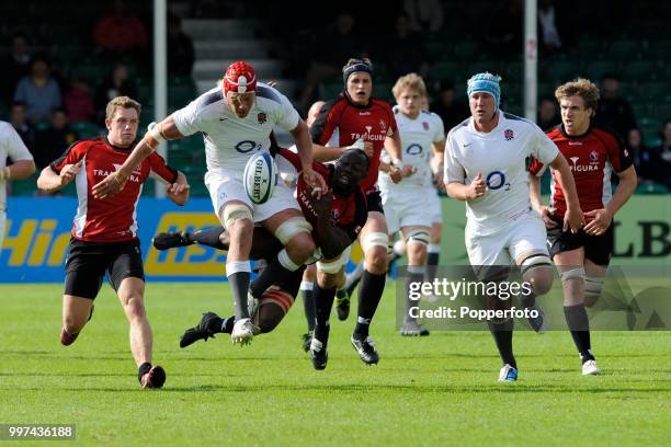 Mouritz Botha of England Saxons and Nanyak Dala of Canada in action during the Churchill Cup Final between England Saxons and Canada at Sixways...