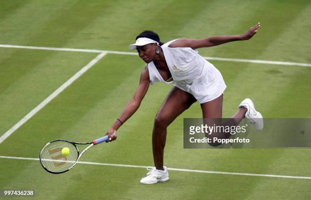 Venus Williams of the USA in action on Day One of the Wimbledon Lawn Tennis Championships at the All England Lawn Tennis and Croquet Club in London...
