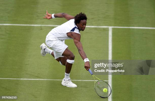 Gael Monfils of France in action on Day One of the Wimbledon Lawn Tennis Championships at the All England Lawn Tennis and Croquet Club in London on...