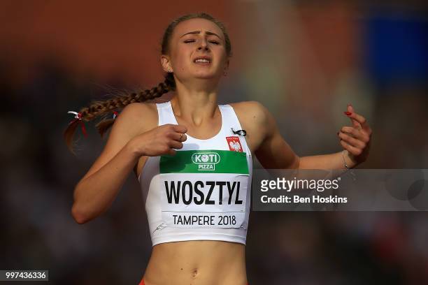 Natalia Wosztyl of Poland reacts following heat 2 of the women's 400m hurdles semi final on day three of The IAAF World U20 Championships on July 12,...