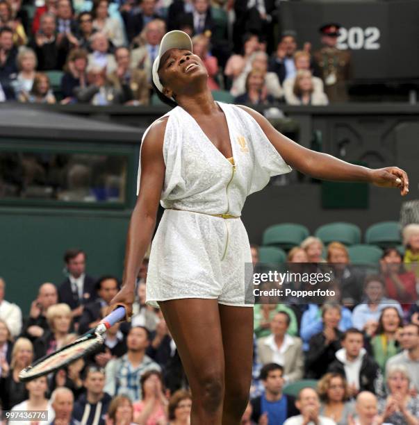 Venus Williams of the USA reacts during her match on Day Two of the Wimbledon Lawn Tennis Championships at the All England Lawn Tennis and Croquet...