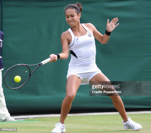 Heather Watson of Great Britain in action on Day Three of the Wimbledon Lawn Tennis Championships at the All England Lawn Tennis and Croquet Club in...