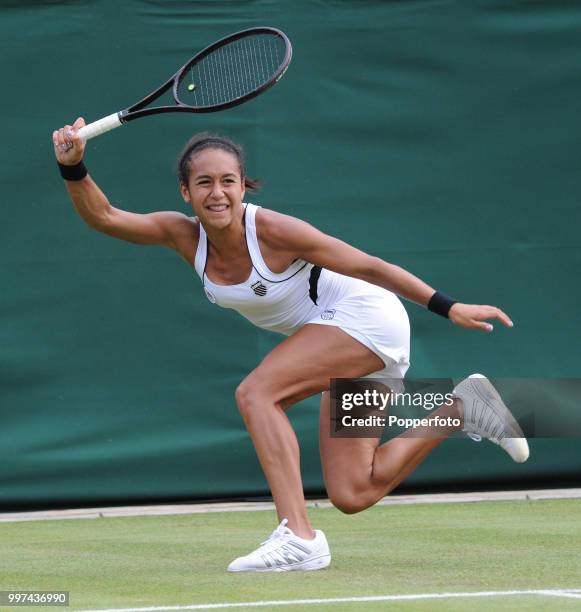 Heather Watson of Great Britain in action on Day Three of the Wimbledon Lawn Tennis Championships at the All England Lawn Tennis and Croquet Club in...