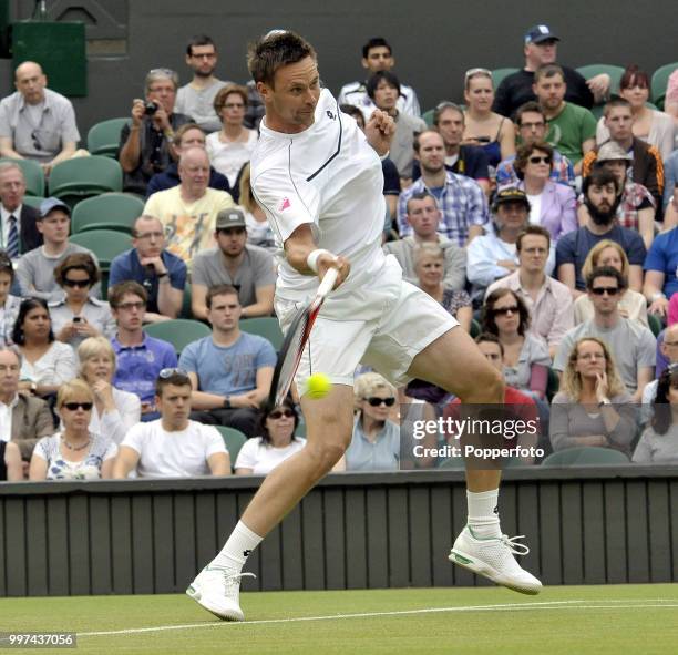 Robin Soderling of Sweden in action on Day Four of the Wimbledon Lawn Tennis Championships at the All England Lawn Tennis and Croquet Club in London...